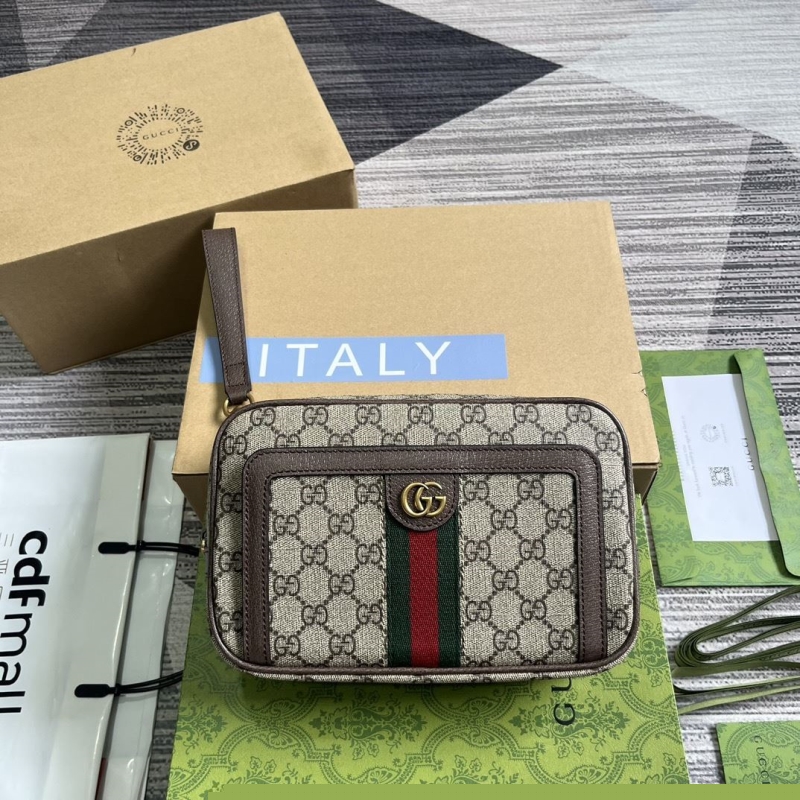 G*u*i clutch bags